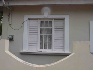Double hung window with side louvers, Falmouth, Jamaica.