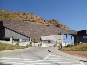 Salt Lake City's Natural History Museum frames the mountains and boasts some amazing green roofs and solar panels, although a road of asphalt does lead up to it.