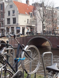 A typical canal and bicycles on any random street in Amsterdam.