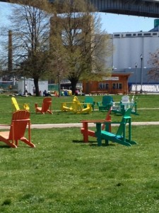 A great view of the grain elevators, Adirondack chairs and vibrancy of Canalside.