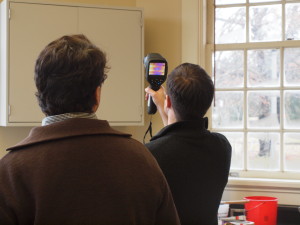 Marcus Eliason from Apollo BBC studies energy loss in the Lee H. Nelson Hall with the assistance of an infrared  tool.  